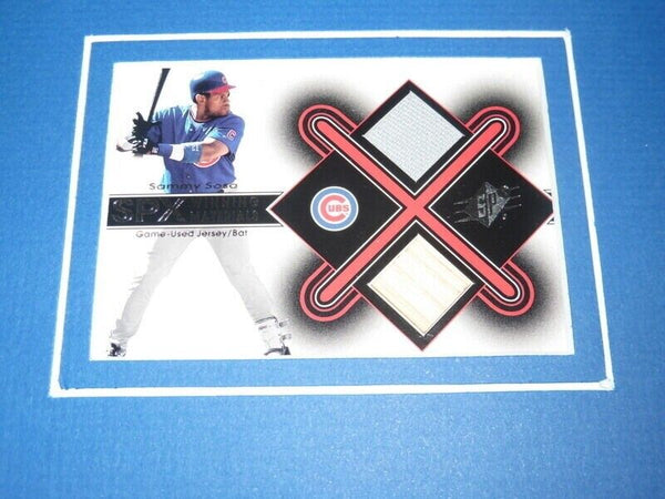 Sammy Sosa 16x20 Framed Game Used Bat, Jersey & Photo Display Cubs UDA